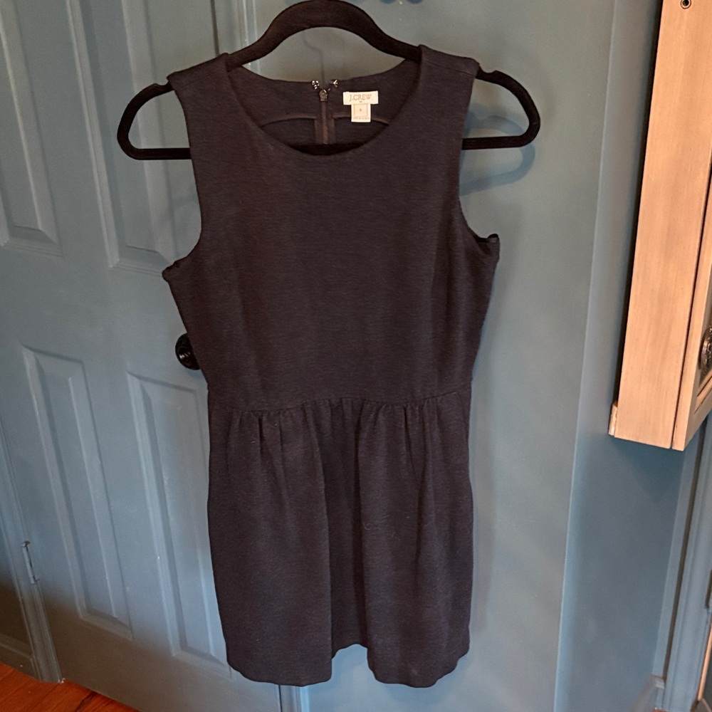 sleeveless black dress from J.Crew with a zippered back and pockets